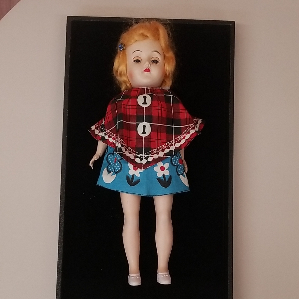 Vintage Doll with Red Plaid Cape